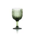 Verre à vin nervuré en verre vert mousse vu de face sur son pied court