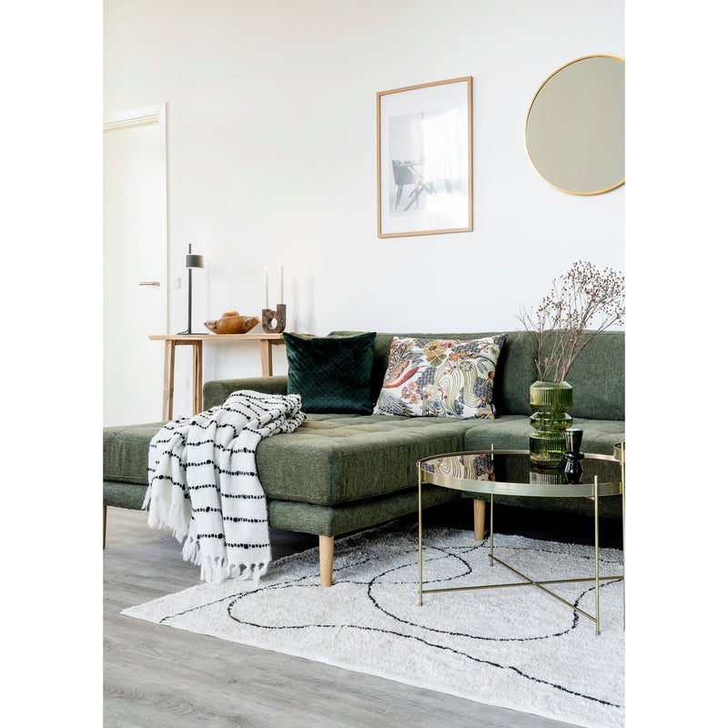 Wie kombiniert man Farben und Materialien in einem Wohnzimmer?