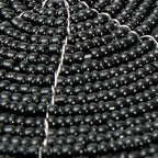 Dessous-de-verre rond en perles noires 10 cm, vue 4