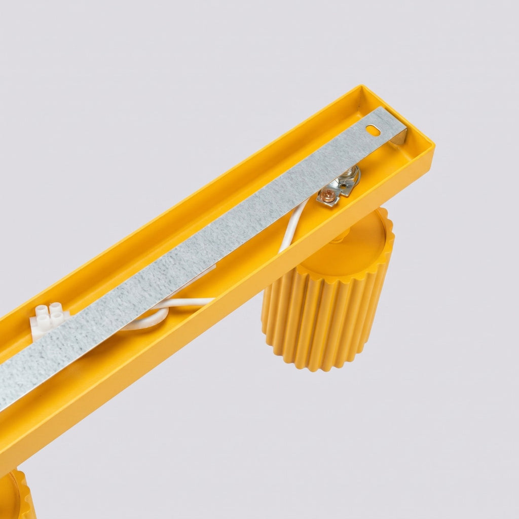 Plafonnier Karbon rampe 4 spots aluminium jaune GU10 en situation