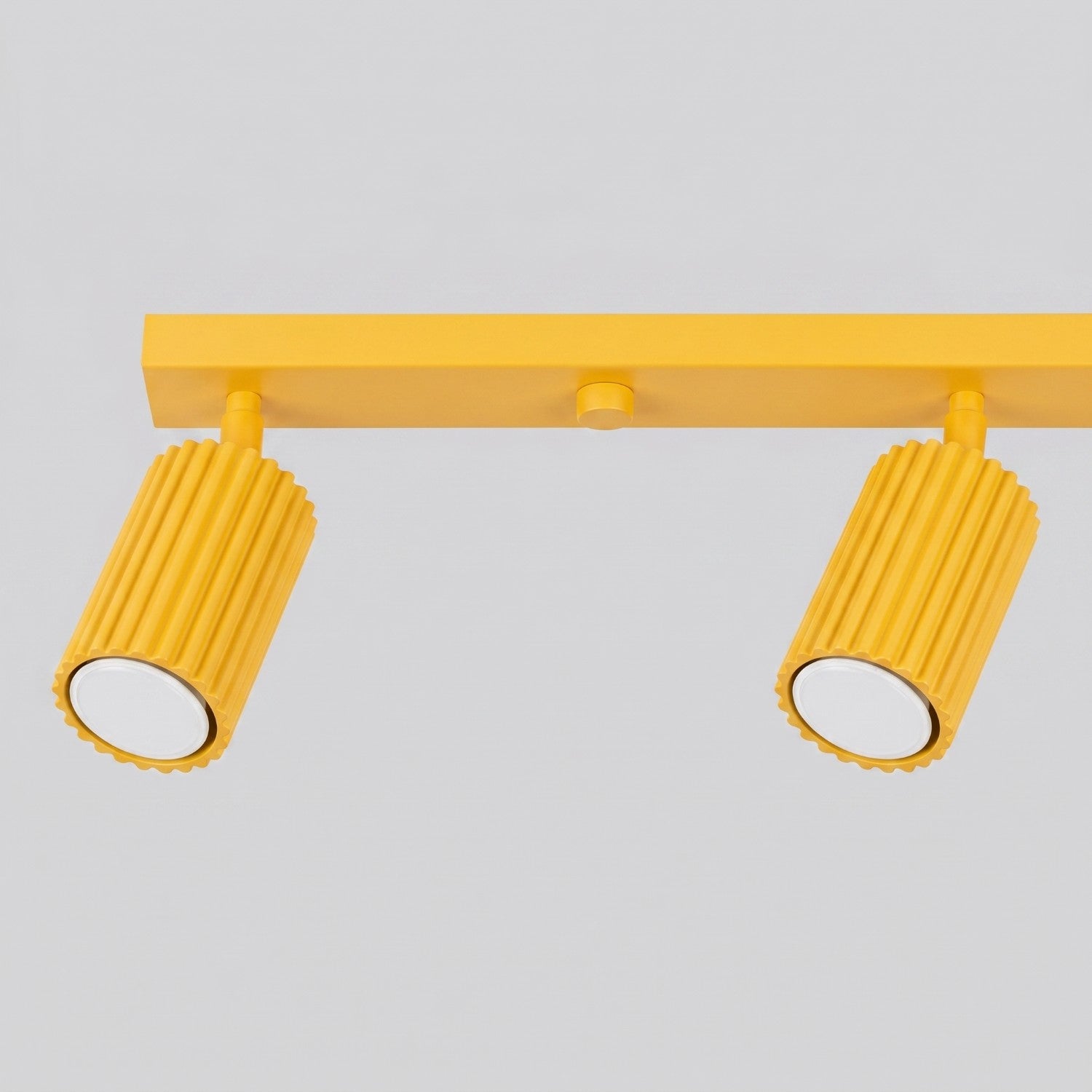 Plafonnier Karbon rampe 4 spots aluminium jaune GU10 détail des cannelures