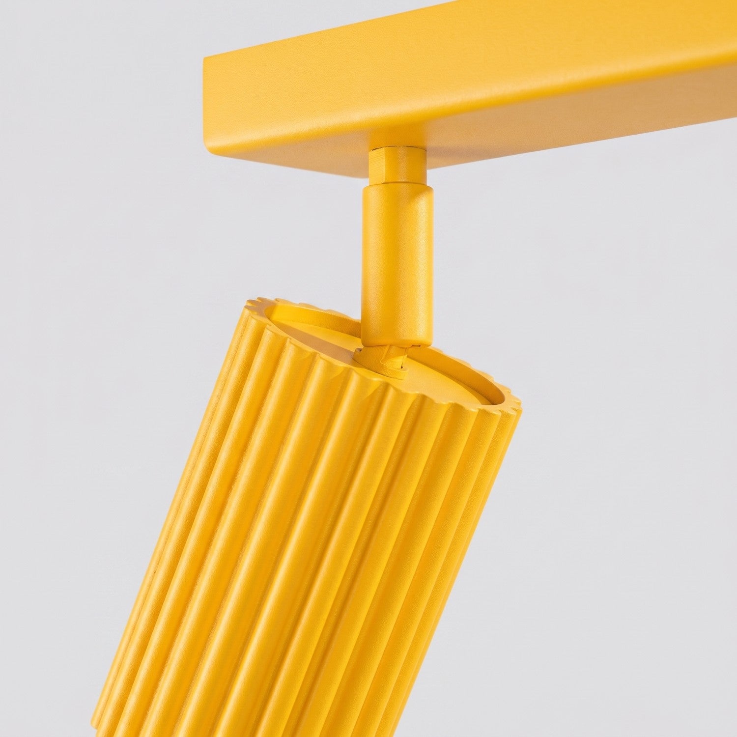 Plafonnier Karbon rampe 4 spots aluminium jaune GU10 ambiance