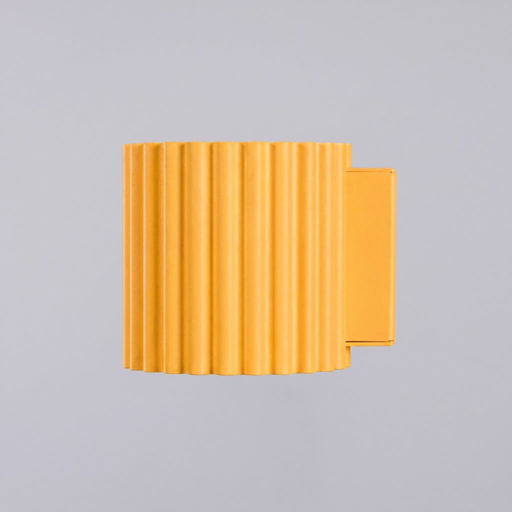 Applique murale Aura aluminium jaune G9 détail des cannelures