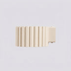 Applique murale Aura aluminium beige GX53 détail des cannelures