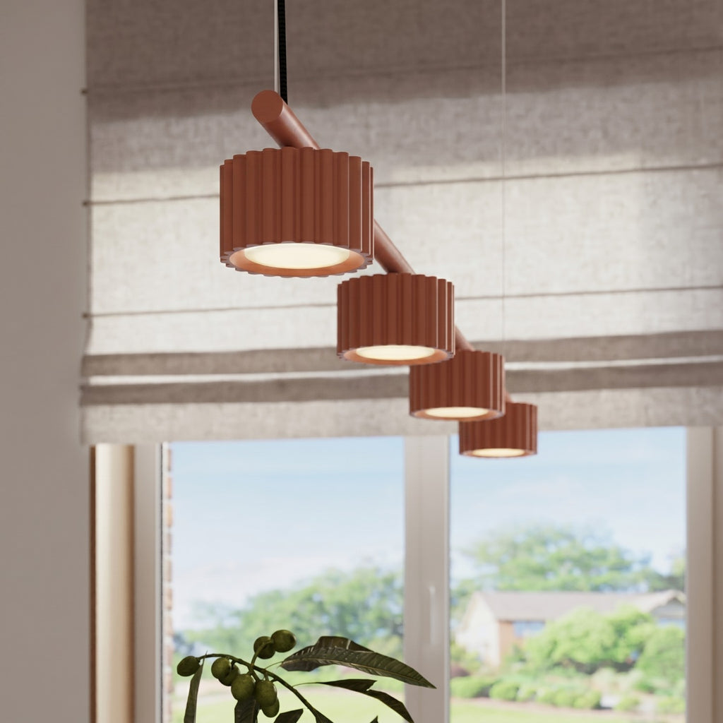 Lustre Aura rampe 4 tambours aluminium rouge ocre GX53 en situation