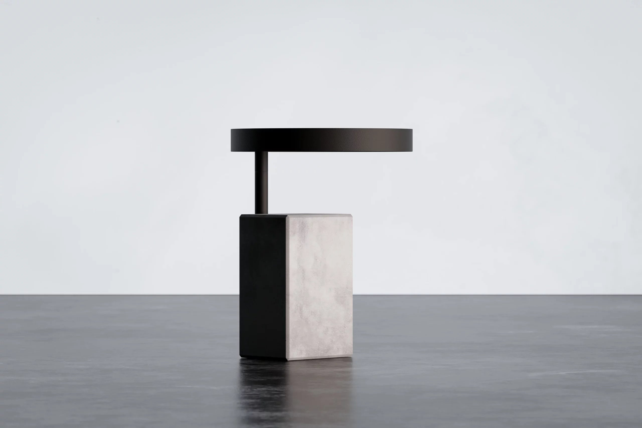 Table d'appoint en béton Twist noir en situation 3