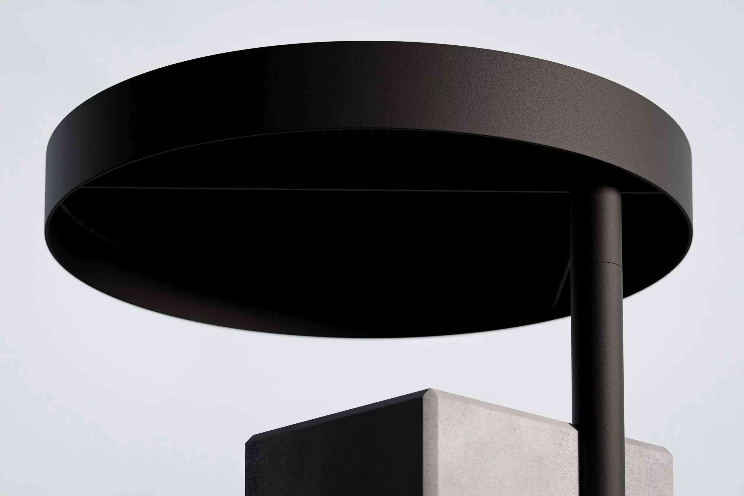 Table d'appoint en béton Twist noir en situation 2