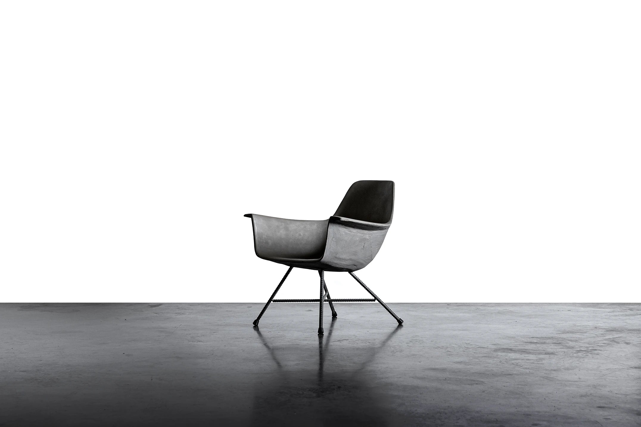 Fauteuil bas en béton Hauteville gris naturel en situation 4