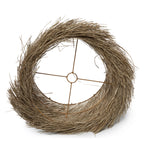 Abat-jour en pandan naturel vu de dessous avec son armature à bague centrale et sa frange tout autour