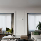 Applique Aliza acier blanc au-dessus d'un lit