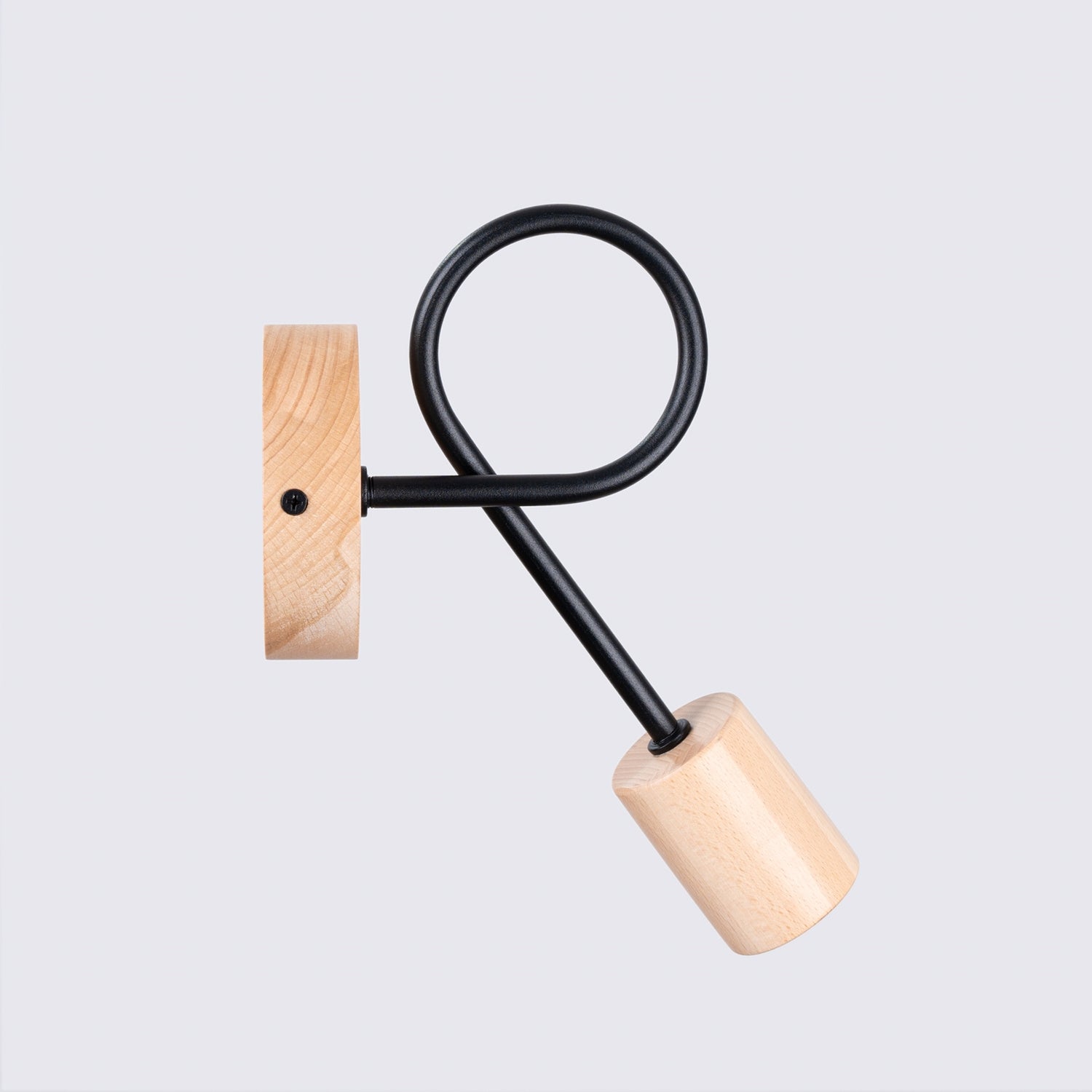 Applique Ember bois et métal noire E27 dans un intérieur