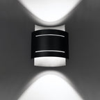 Applique Hestia acier noir allumée, deux halos vers le haut et le bas