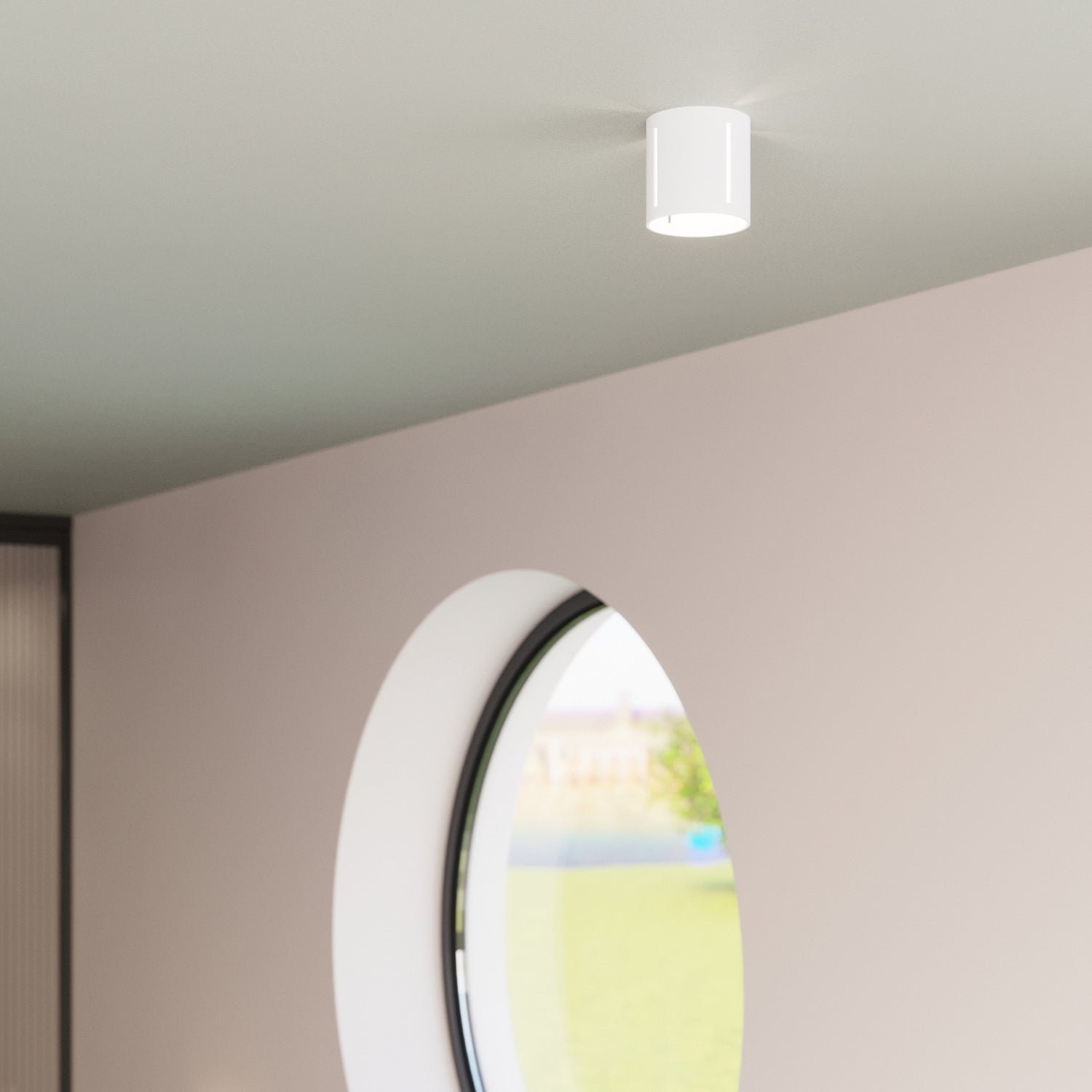 Applique Inez blanche en situation, jeu de lumière sur le mur