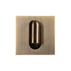 Applique Bronz teinte bronze vue de face spot replié dans la niche de sa platine carrée