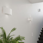 Applique Magnus acier blanc, double halo sur le mur