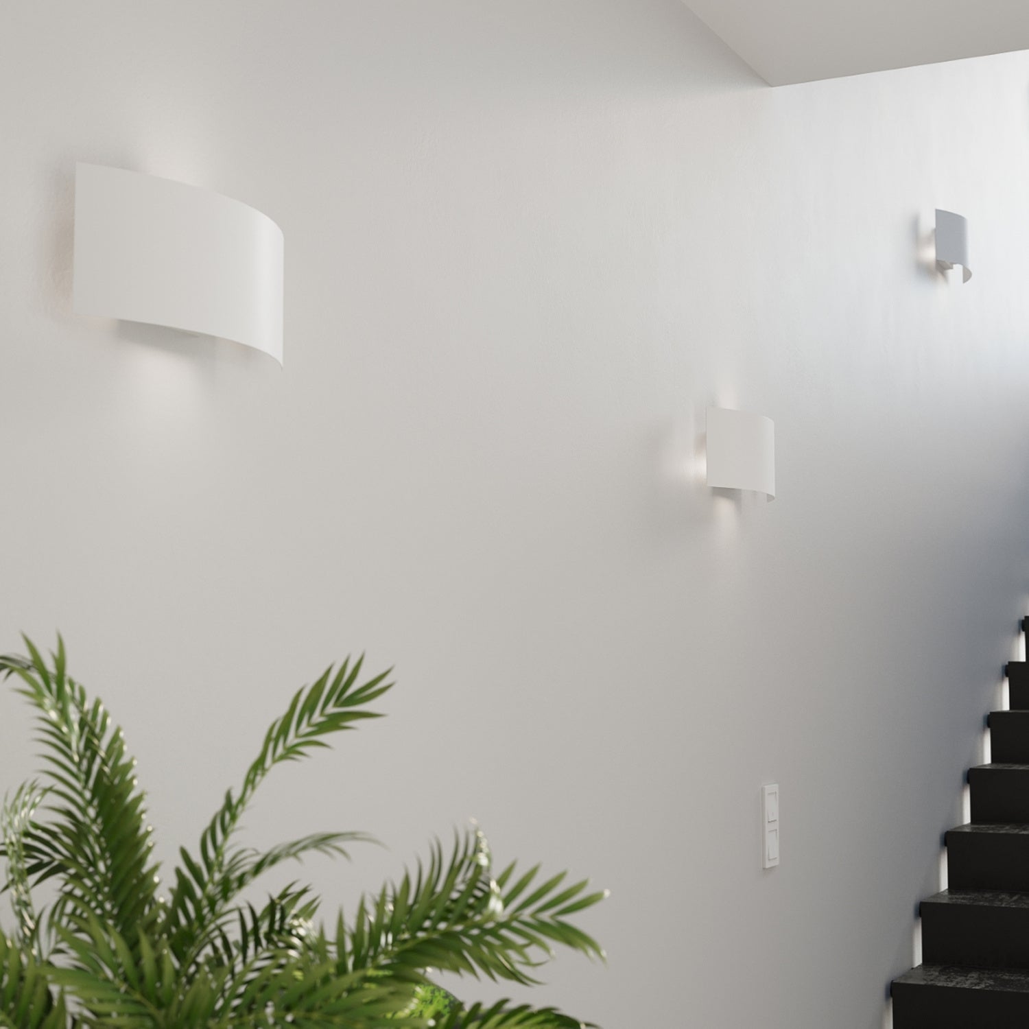 Applique Magnus acier blanc, double halo sur le mur