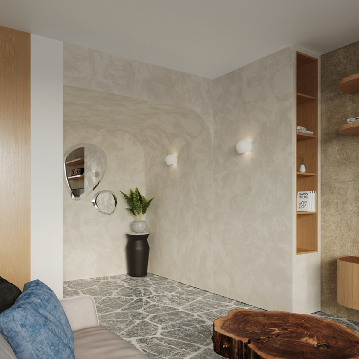 Deux appliques murales Globe blanches dans un salon aux murs enduits avec miroirs organiques et table en bois brut