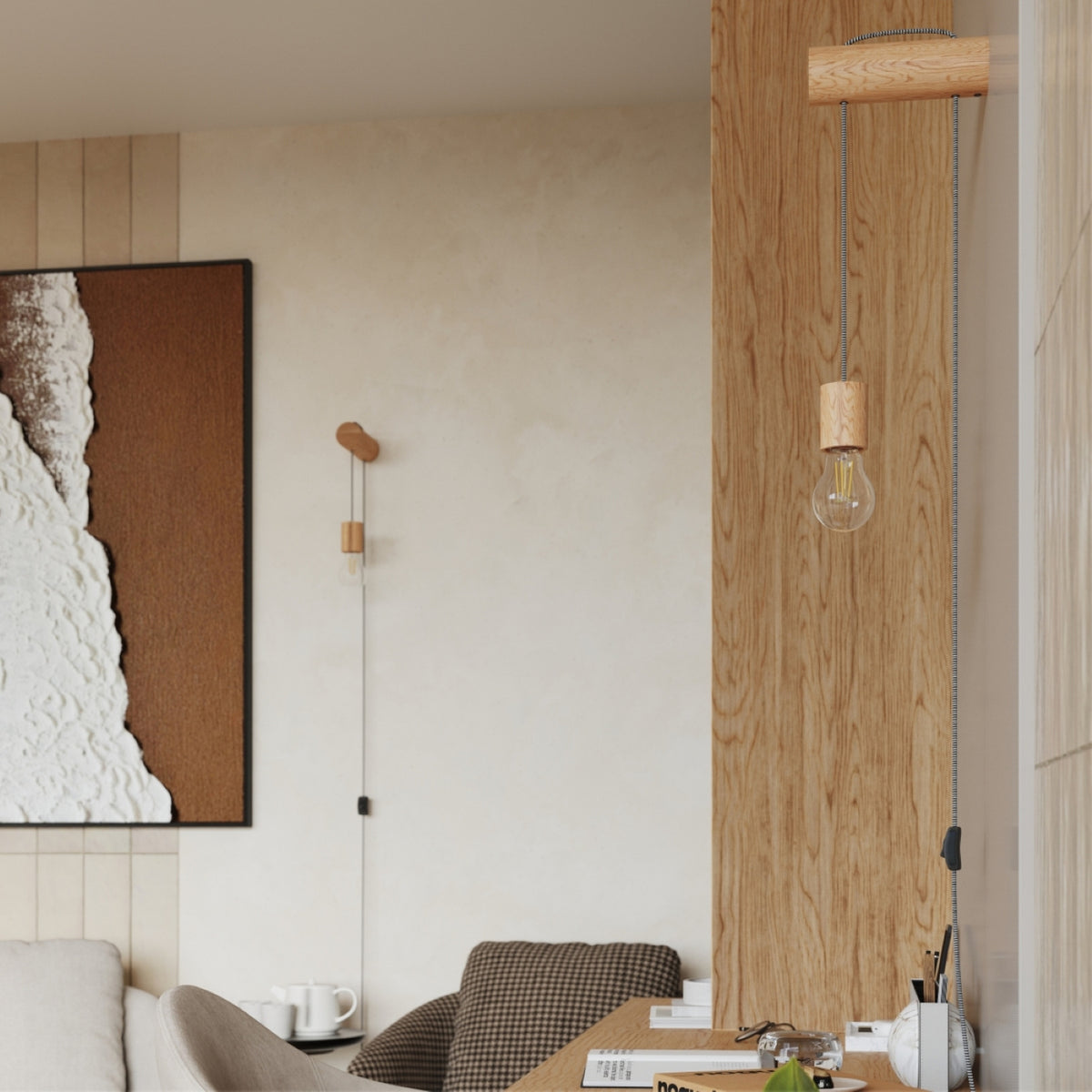 Applique Nimbi au-dessus d'un bureau avec son cordon le long d'un panneau de bois