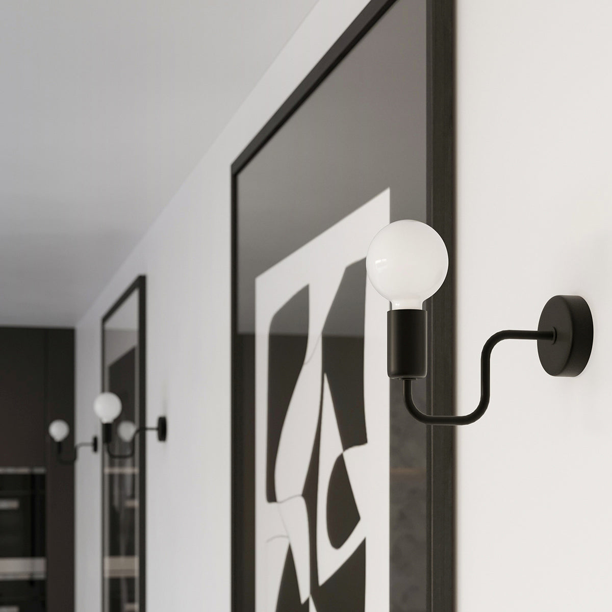 Appliques Vector noires en série le long d'un couloir aux murs blancs et aux cadres noirs