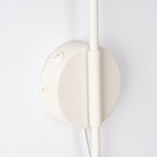 Applique Nox bras déporté acier beige E14 avec interrupteur, détail du bras et de la rosace