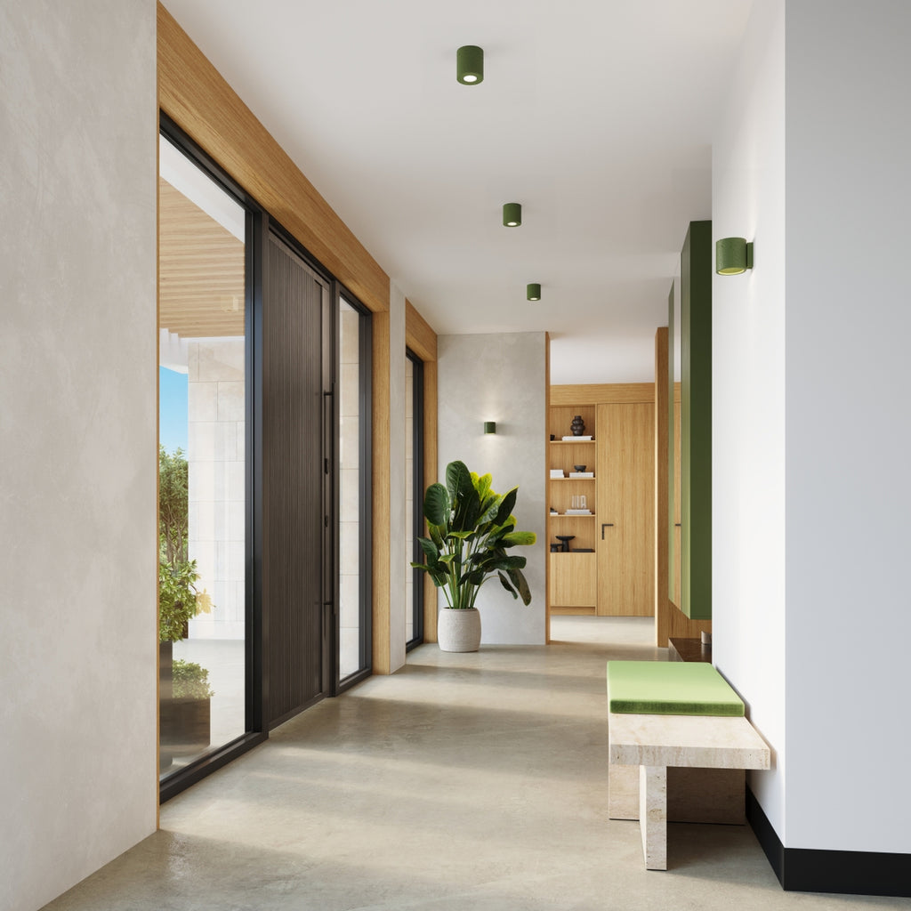 Applique Orbis béton vert olive G9 en situation dans un intérieur
