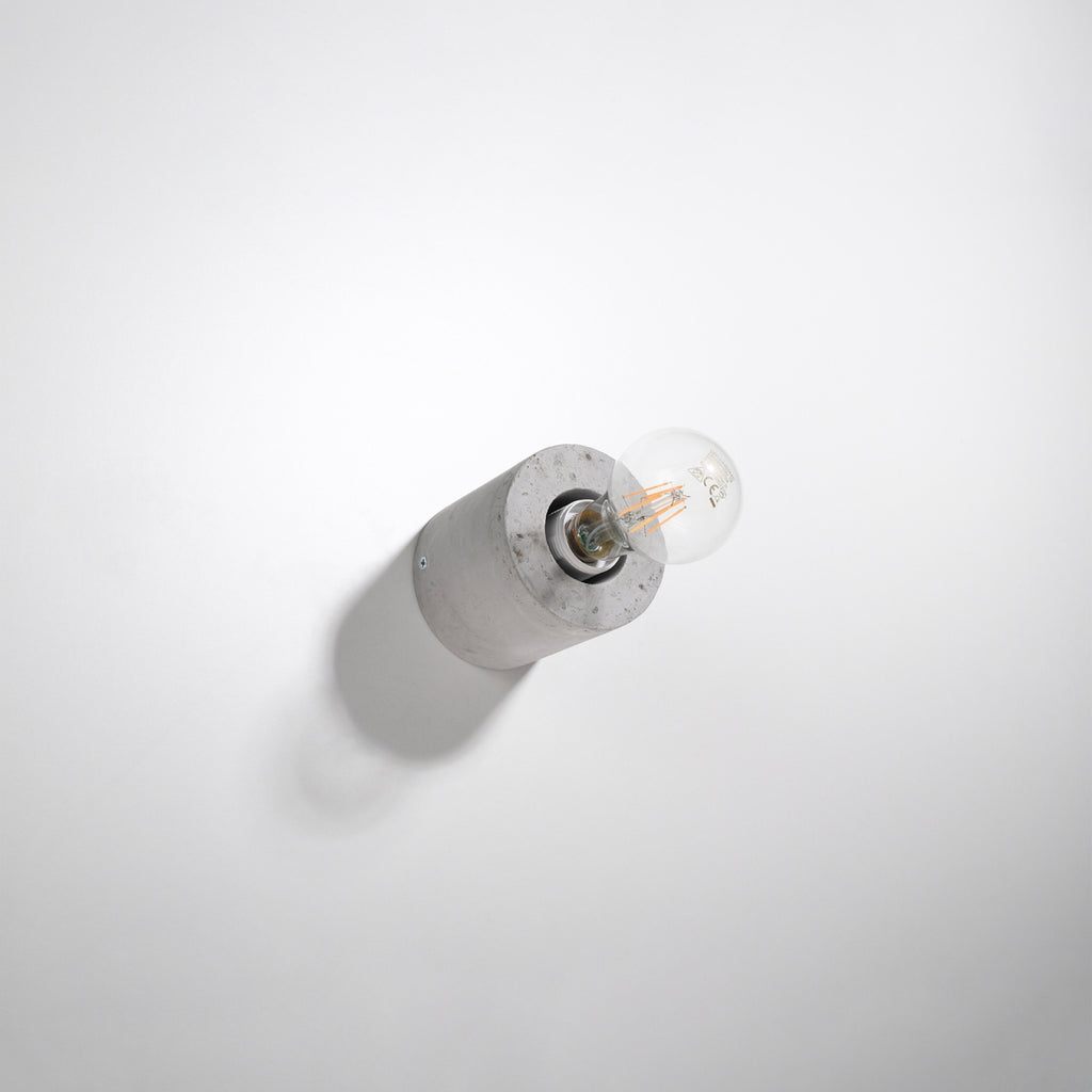 Applique Salgado en béton brut, cylindre à ampoule apparente, vue de profil