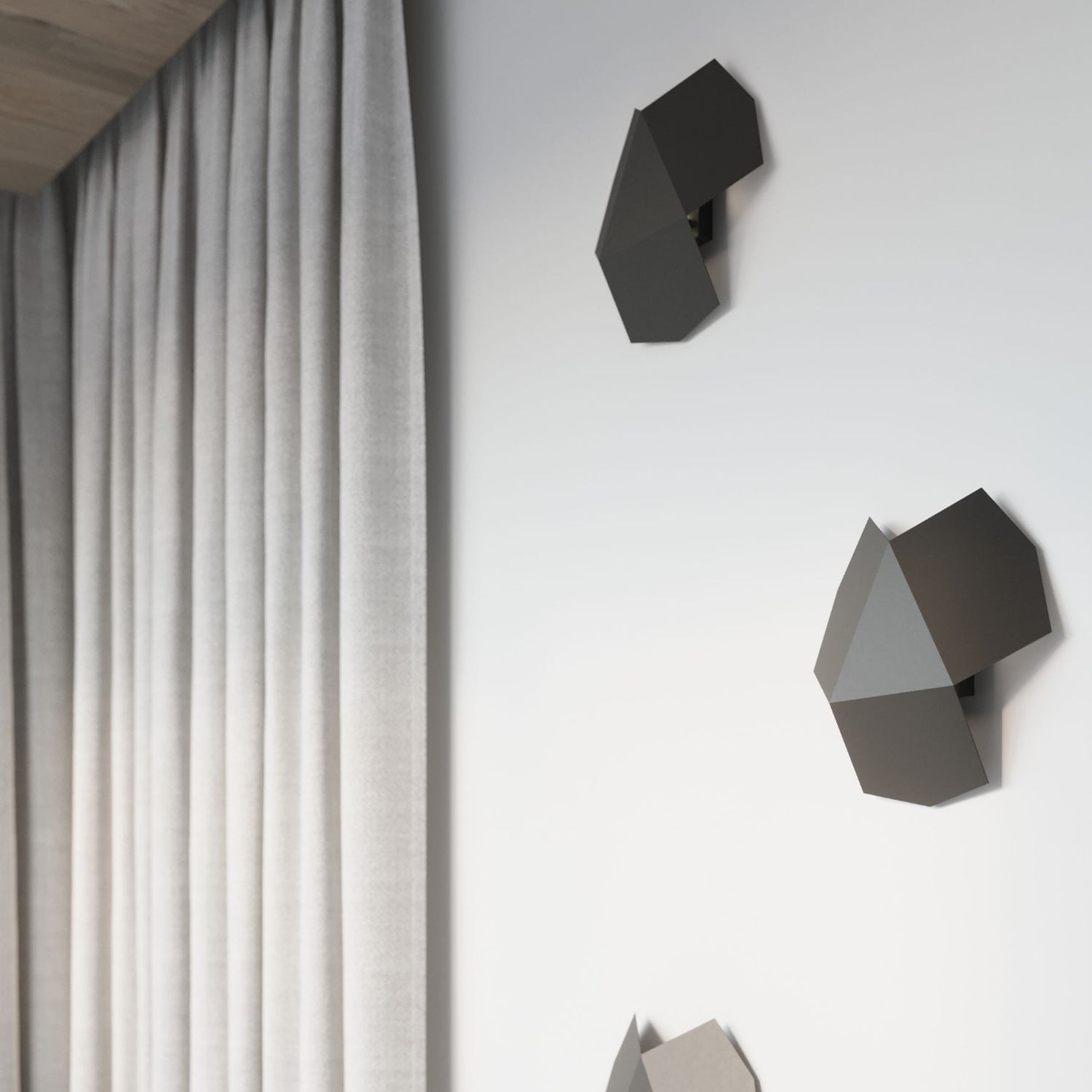 Applique Tre acier noir dans une pièce contemporaine