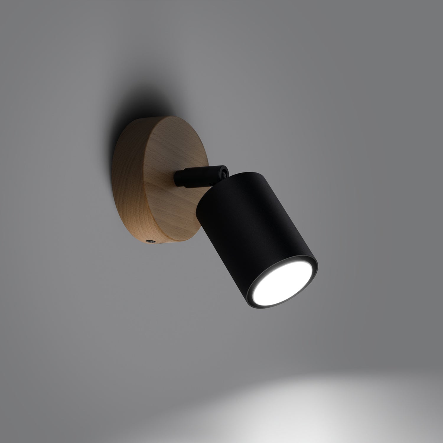 Applique Verdo bois et acier noir GU10 allumée, faisceau orientable