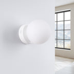 Applique Yoli 1 boule opale acier blanche G9 de profil