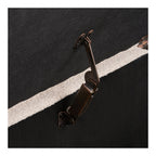 Banc coffre Harlow détail charnière bronze couvercle intérieur tissu noir rangement caché