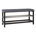Banc chaussures Padova assise grise rembourrée étagères métal pieds noirs vue trois quarts