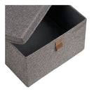 Boîte de rangement Noto gris foncé ouverte sur son intérieur doublé de tissu noir