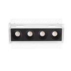 Boîtier encastré Modular blanc équipé du module à quatre cellules noires vu de face entre ses deux ailettes perforées
