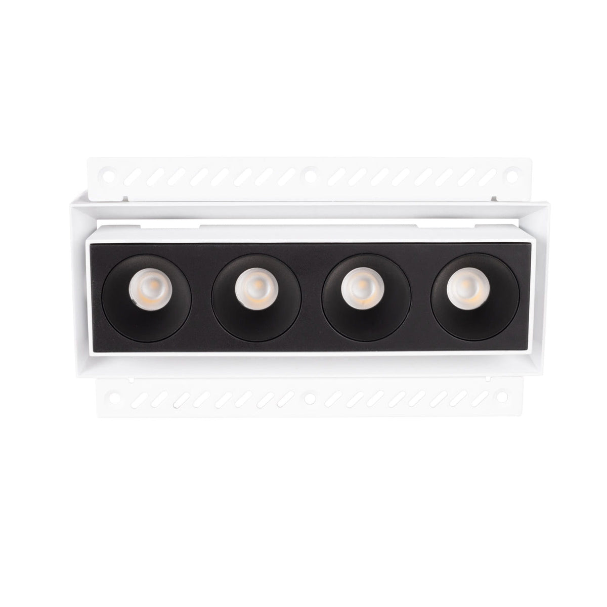 Boîtier encastré Modular blanc équipé du module à quatre cellules noires vu de face entre ses deux ailettes perforées