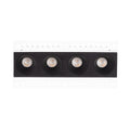 Boîtier de spot encastré sans cadre Modular blanc équipé d'un module noir à quatre cellules entre ses deux ailettes perforées