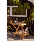 Bol Viola grès beige sur un chariot en bois en terrasse avec raisins