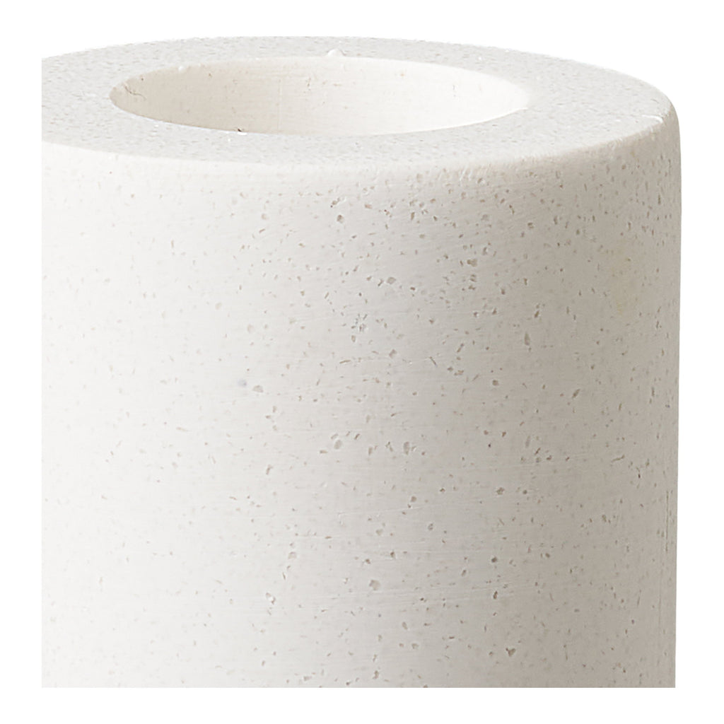 Gros plan texture granuleuse calcaire blanc naturel bougeoir bipolaire finition mate