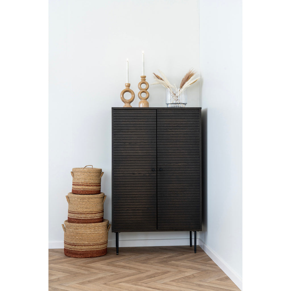Paire bougeoirs céramique camel sur commode noire entrée décoration bohème scandinave