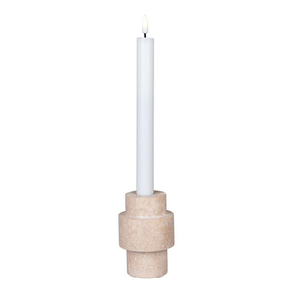 Bougeoir travertin naturel profil disques empilés Ø7 H10 cm avec bougie chandelle blanche allumée