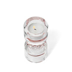 Bougeoir en verre incolore à sphère facettée rose 12 cm en situation
