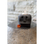 Bougeoir visage en pierre à traits lissés 9 cm en situation