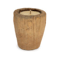 Ancien pot à piler en bois garni de cire avec sa mèche vu de face