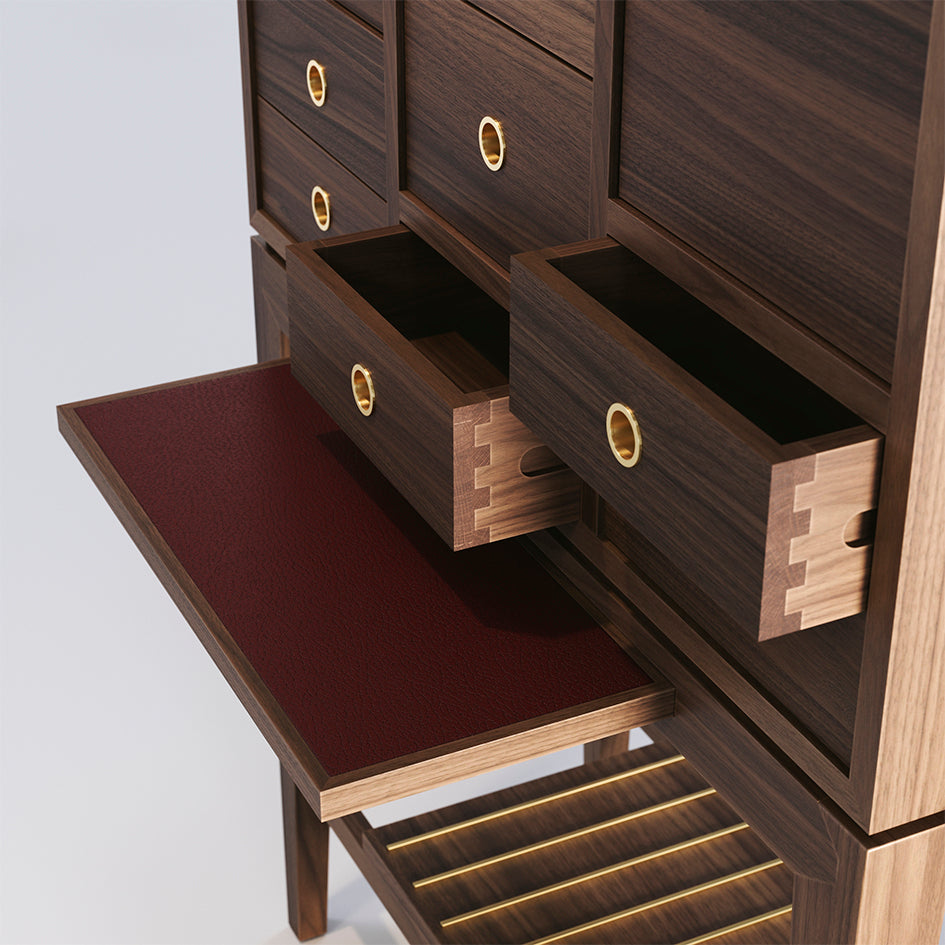 Tablette coulissante gainée de cuir rouge du cabinet Contador Anniversary