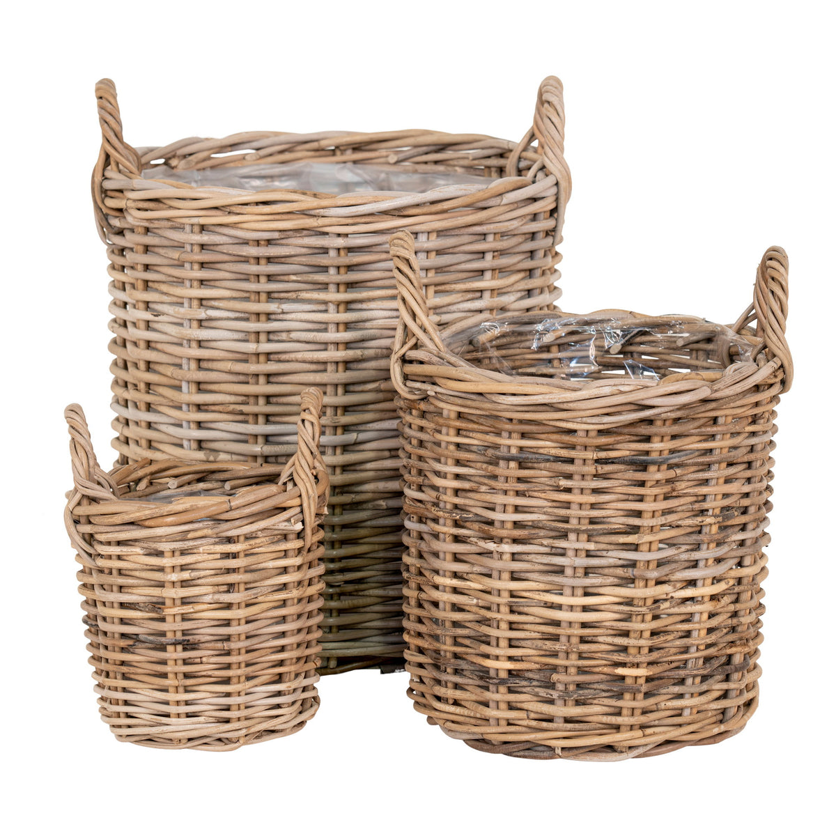 Trois cache-pots Sema ronds en rotin kubu naturel avec anses torsadées et doublure plastique