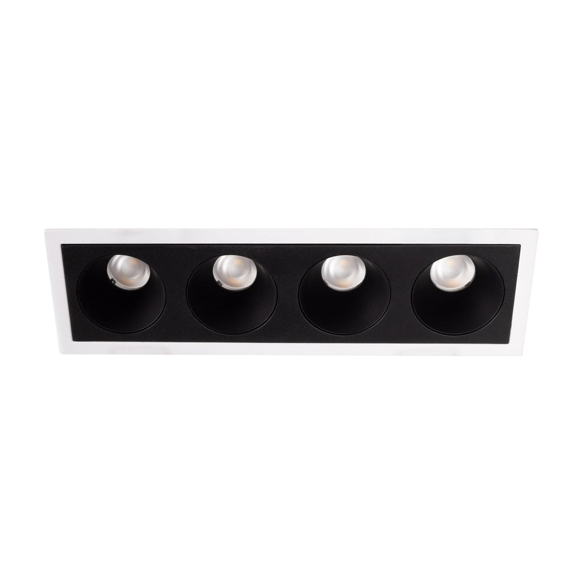 Cadre encastré Modular blanc équipé de son module à quatre cellules noires vu légèrement de biais