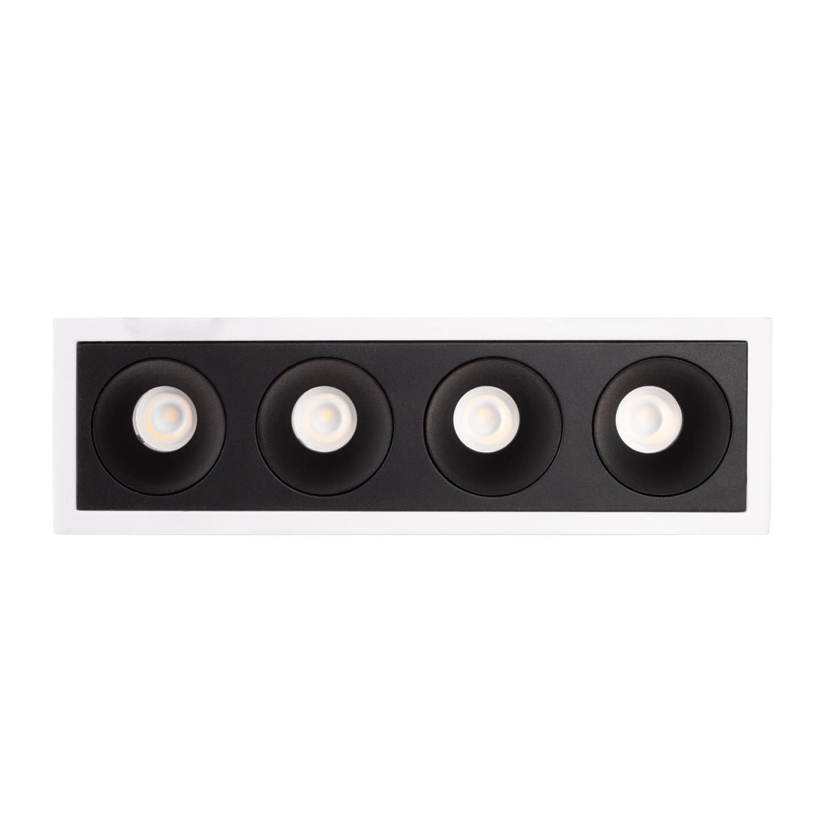Cadre encastré Modular blanc et module à quatre cellules noires vus de face