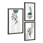 Trois cadres Aspen noirs vus de trois quarts avec leurs affiches de feuillages et d'arches