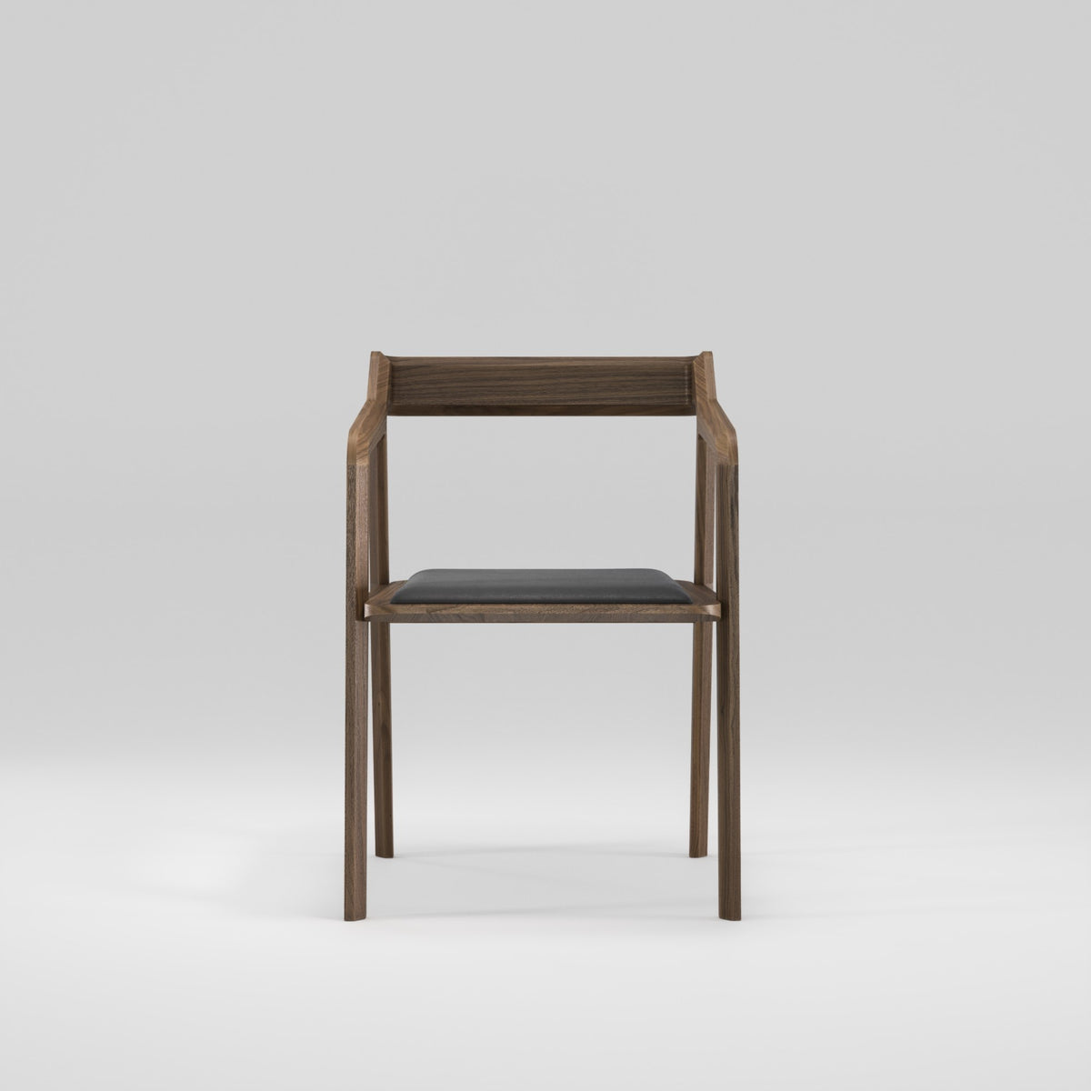 Chaise à accoudoirs Kundera en noyer et cuir graphite vue de face