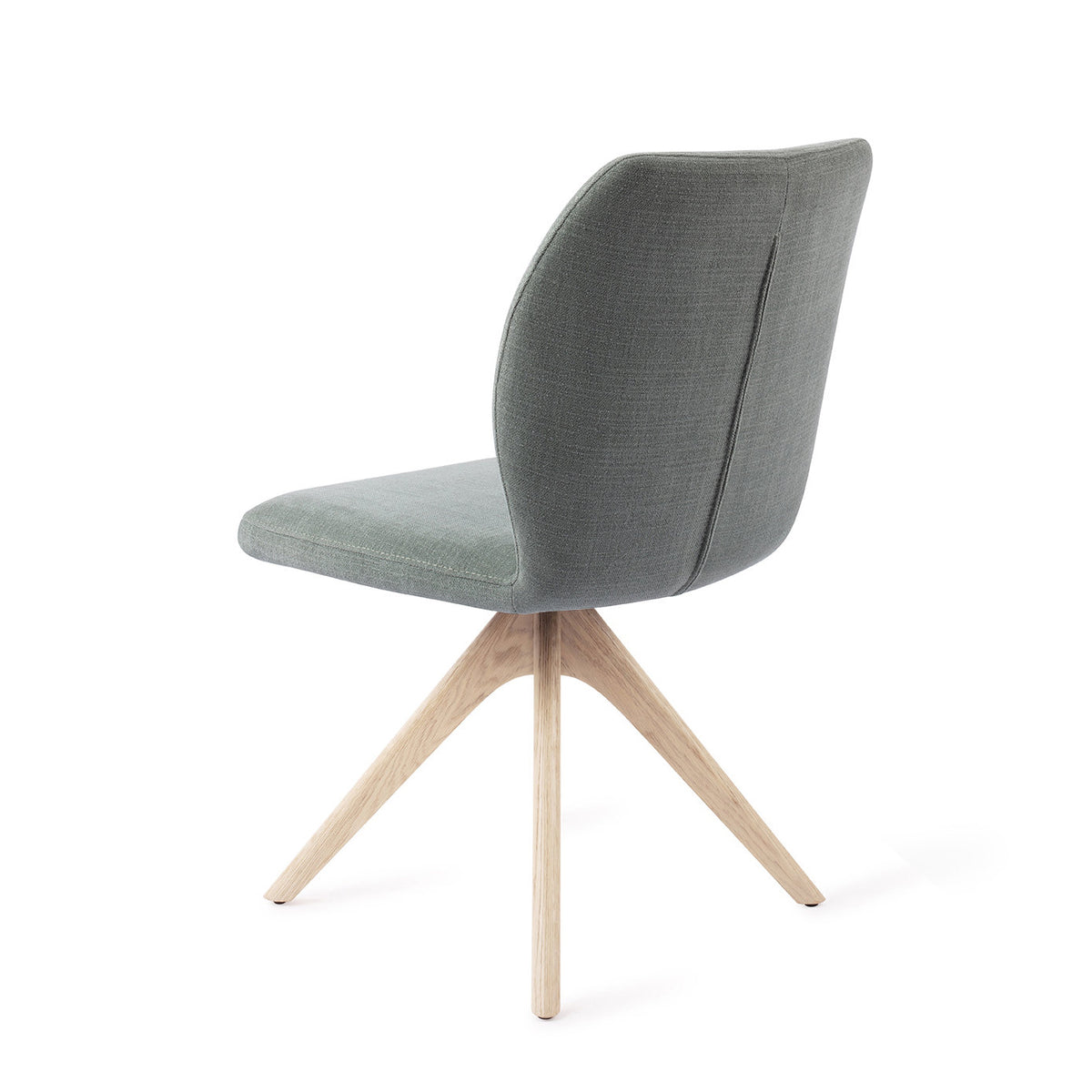 Dos de la chaise Ikata vert sauge avec sa couture verticale et son piètement pivotant chêne blanchi