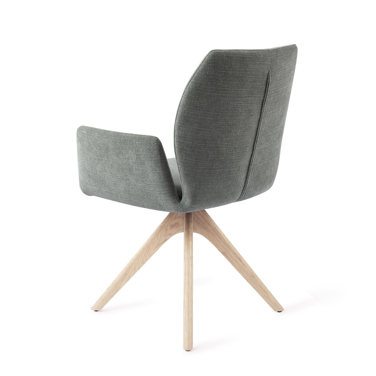 Dos de la chaise Misaki vert sauge avec sa couture verticale et son piètement pivotant chêne blanchi